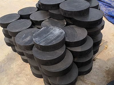 葫芦岛板式橡胶支座由若干层橡胶片与薄钢板经加压硫化